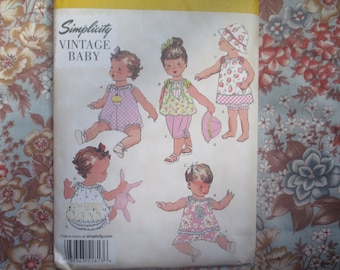 2000s sewing pattern Simplicity 1813 vintage  baby and toddlers romper dress pants top panties and hat sizes XXS-XS-S-M-L