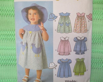 2000s sewing pattern Simplicity 7189 baby or toddlers dress top panties and hat size 6 months-4 years UNCUT