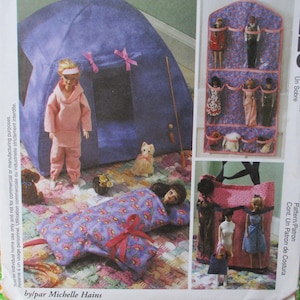 May include: A sewing pattern for a doll-sized tent, sleeping bag, and a hanging organiser with pockets. The pattern is titled "2225 One Envelope, One Pocket, Un Sobre, Cont. Un Patron de Costura, Pattern/Patron".