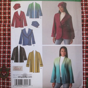 May include: A sewing pattern featuring illustrations of various jacket designs in shades of red, blue, brown, and yellow. The pattern includes a beret and a woman wearing a red jacket and beret. The pattern is designed by Karen Z.