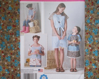 2010s sewing pattern Simplicity 8087 child and misses pullover dress and top