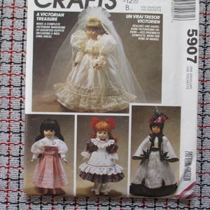 May include: A sewing pattern with a Victorian theme, showing a doll in a wedding dress and three other dolls in Victorian outfits. The text reads "A Victorian Treasure" and "Make a complete Victorian wardrobe of assorted outfits".