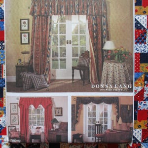 May include: An interior design pattern featuring window treatments, including curtains and valances, in various styles and colors. The image also shows a table with a floral arrangement and a patterned tablecloth. The text "DONNA LANG INTERIOR DESIGN" is visible.