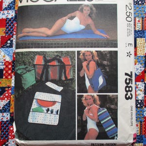 May include: Vintage sewing pattern envelope featuring images of a woman in a white swimsuit with various picnic accessories. The envelope includes a picnic bag, a green cooler, and a picnic utensil holder. The pattern number is 7583.