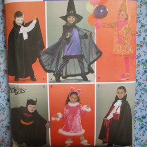 May include: A sewing pattern for children's Halloween costumes. The pattern includes costumes for a vampire, a witch, a clown, a cat, and a bat. The pattern is from the company 'Wrights'.