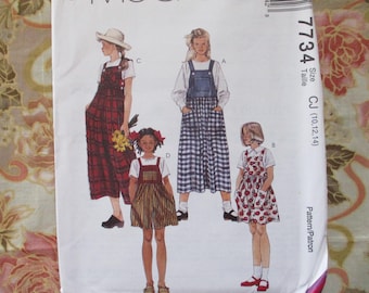 vintage 1990s McCalls sewing pattern 7734 girls' jumper jumpsuit and rompers UNCUT size 10-12-14