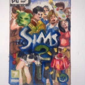 May include: A rectangular fabric patch featuring a hand-painted illustration of The Sims 2 video game cover art. The design includes a crowd of people, a green alien head, a party hat, a dog, and a red skirt, with the text The Sims 2.
