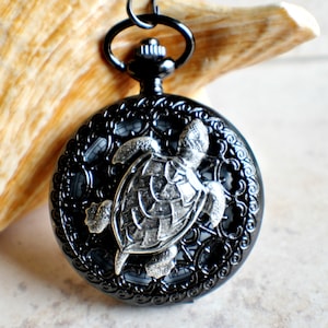 Turtle men&#39;s black pocket watch, front case is mounted with silver sea turtle
