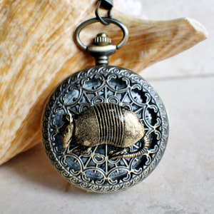 Armadillo pocket watch, mens pocket watch with armadillo mounted on front case.