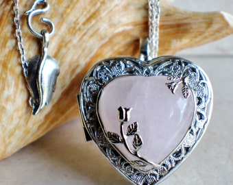 Rose quartz music box locket, heart shaped locket with music box inside, in silver tone with rose quartz crystal heart.