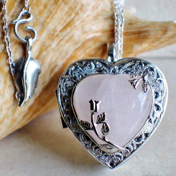 Rose quartz music box locket, heart shaped locket with music box inside, in silver tone with rose quartz crystal heart.