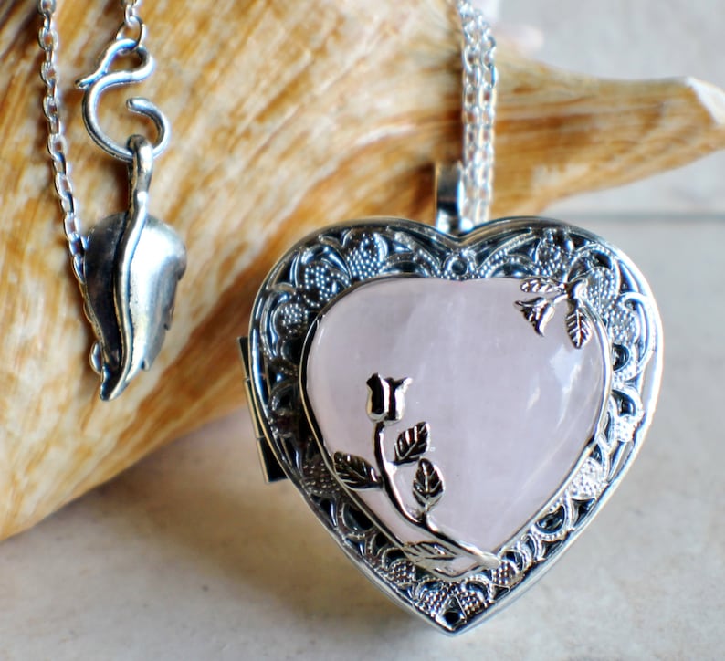 Rose quartz music box locket, heart shaped locket with music box inside, in silver tone with rose quartz crystal heart. 