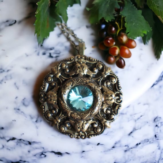 ターコイズクリスタルオルゴールロケットネックレス：ブロンズ