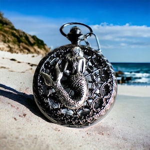 Mermaid pocket watch, mens black pocket watch with mermaid mounted on front case.