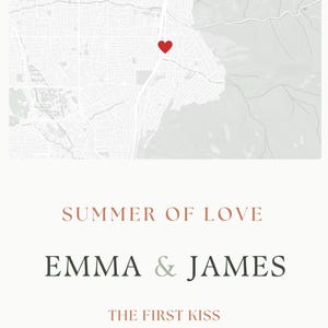 May include: A personalized map print featuring a grayscale street map with a red heart icon marking a specific location. Below the map, the text reads: SUMMER OF LOVE, EMMA & JAMES, THE FIRST KISS, and the coordinates 40.6839° N, -111.7960° W.