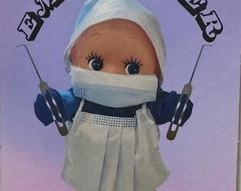 Embalmer Kewpie Doll Sticker