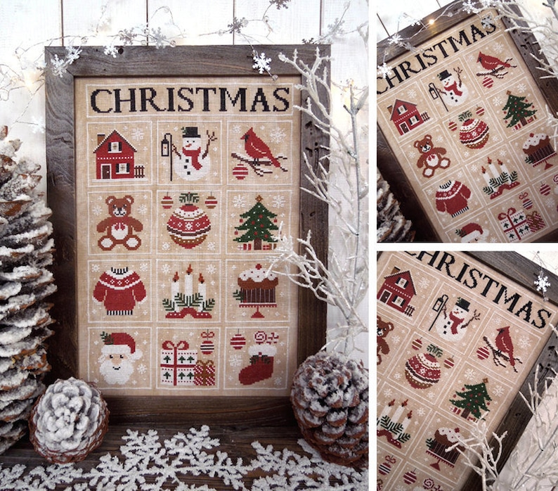 May include: A framed cross-stitch pattern with a beige background and red, green, and white accents. The pattern features a variety of Christmas-themed images, including a house, a snowman, a cardinal, a teddy bear, a Christmas tree, a stocking, and a gift. The title of the pattern is "CHRISTMAS".