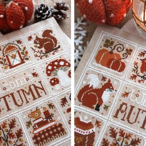 K&ouml;nnte beinhalten: Ein Kreuzstich-Sampler mit Herbstmotiven, darunter K&uuml;rbisse, ein Eichh&ouml;rnchen, ein Fuchs und ein Vogel. Die Worte "Welcome AUTUMN" sind in der Mitte gestickt. Die Farbpalette umfasst warme T&ouml;ne von Orange, Braun und Beige.