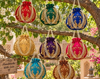 May include: Eight round drawstring pouches in red, green, blue, gold, purple, magenta, teal, and brown. Each pouch features gold peacock embroidery, a pearl bead handle, and a wooden sign reading Handmade With Love with a heart symbol.