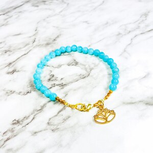 Beaded bracelet, blue stone bracelet, beaded gemstone bracelet, gemstone bracelet, lotus charm, charm bracelet, yoga bracelet, lotus