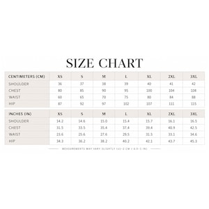 May include: A size chart table displaying measurements in centimeters and inches for sizes XS through 3XL. The chart lists shoulder, chest, waist, and hip dimensions with a note stating that measurements may vary slightly by 1-2 cm or 0.5-1 inch.