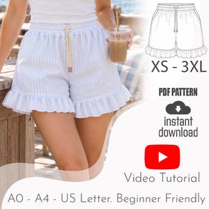 May include: Light blue and white striped shorts with a ruffled hem, an elastic waistband, and a drawstring. The image includes a technical line drawing, the text XS - 3XL, PDF PATTERN, instant download, and Video Tutorial A0 - A4 - US Letter.
