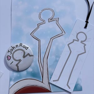 May include: A circular pinback button with the text John Rod and a heart icon, a rectangular bookmark with a black ribbon, and a rectangular print, all featuring a stylized white line-art silhouette of a figure against a blue background.