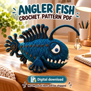 Puede incluir: Un pez rape de ganchillo azul con un ojo blanco, dientes blancos y un señuelo de bombilla colgante. El texto dice ANGLER FISH CROCHET PATTERN PDF y Digital download NO Physical item will be shipped.