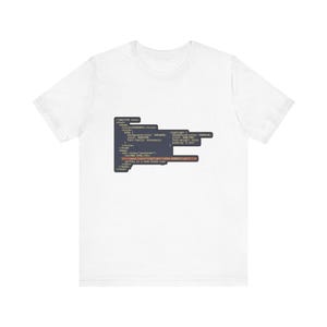 May include: A white short-sleeved t-shirt featuring a dark gray rectangular graphic on the chest. The graphic displays lines of HTML and CSS code, including tags like DOCTYPE, head, body, and a highlighted span element with red text.