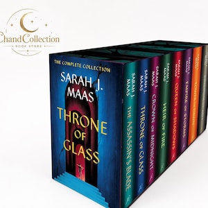 May include: A complete book collection box set by Sarah J. Maas titled Throne of Glass. The set includes The Assassin's Blade, Throne of Glass, Crown of Midnight, Heir of Fire, Queen of Shadows, Empire of Storms, Tower of Dawn, and Kingdom of Ash.