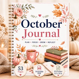 May include: A spiral-bound October Journal with a white cover featuring watercolor illustrations of pumpkins, autumn leaves, and flowers. The text reads October Journal, Plan, Focus, Grow, Reflect, 53 Pages, Printable PDF, and US Letter 8.5 x 11 in.