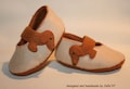 Felt baby shoes Dachshund product logo