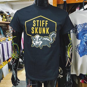 Stiff Skunk logo black t-shirt crew neck funny animal cartoon illustration comic graphic design Gildan unisex tee