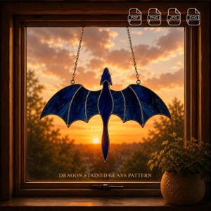May include: A blue stained glass dragon suncatcher with outstretched wings, suspended by two metal chains. The dragon features a dark blue marbled glass texture with thin metal framing. The text DRAGON STAINED GLASS PATTERN is visible.