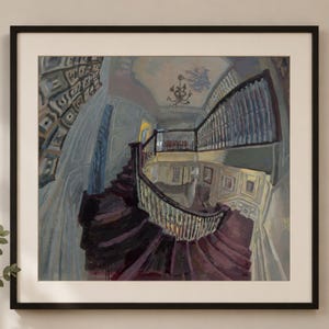 May include: A framed painting depicting a wide-angle view of a grand interior staircase with dark wooden steps and a white railing. The walls are painted in shades of grey and blue, featuring a chandelier hanging from the ceiling above the landing.