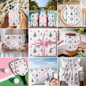 May include: A collection of Christmas-themed items with a pink and white damask pattern. The items include a phone case, tote bag, travel bag, napkins, cosmetic bag, wrapping paper, mug, pickleball paddles, and a blanket. Each item features a monogram letter.