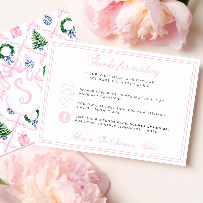May include: A pink and white greeting card with the text "Thanks for visiting" in elegant script. The card includes contact information and a Facebook link. A floral pattern card is visible in the background, along with pink flowers.