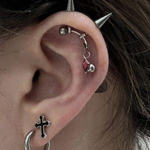 Curved Cartilage Barbell with Red Faceted Drop and Spike Ends Titanium steel material