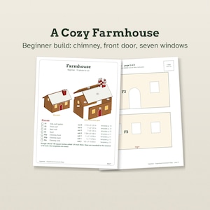 May include: A printed instructional guide titled A Cozy Farmhouse for a beginner build featuring a chimney, front door, and seven windows. The pages display diagrams of gingerbread house components labeled F1 through F5c with dimensions in inches.
