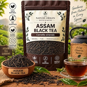 May include: A brown stand-up pouch of The Nature Origin Assam Black Tea with a clear window showing dark tea leaves. The label features the text Assam Black Tea, Camellia sinensis, and icons for natural, no additives, and premium quality.