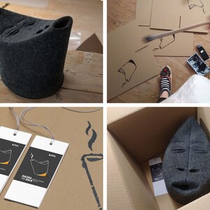 May include: A dark gray felt mask with a stylized face, displayed in various stages of creation. The mask is shown on a wooden surface, in a cardboard box, and with tags. The tags read "Maska the Mask" and "Kaczka the Duck".