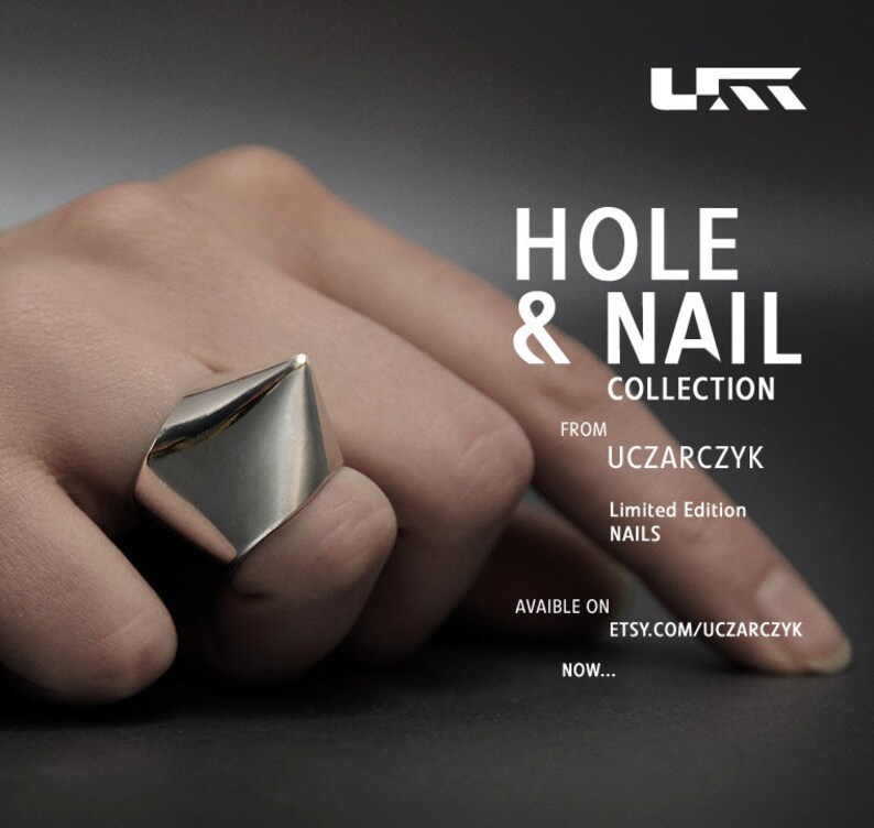 May include: A silver ring with a pointed, geometric design. The ring is part of the "Hole & Nail Collection" from UCZARCZYK, a limited edition of nails. The ring is available on Etsy.com/uczarczyk.