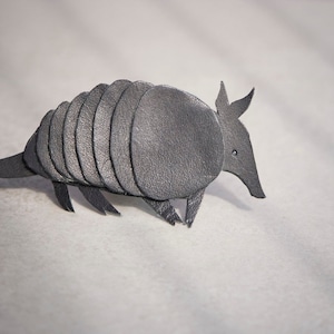 Armadillo Brooch. Natural black recycled leather.