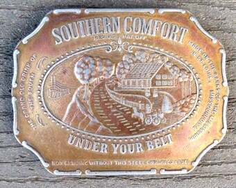 Southern Comfort brass belt buckle.