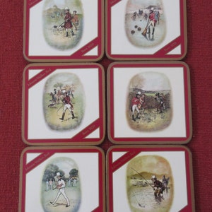 May include: Six square coasters with gold trim and red borders. Each coaster features a different illustration of a man in a historical setting. The illustrations are in a vintage style and include scenes of a man playing golf, a man ice skating, a man riding a horse, a man playing cricket, a man fishing, and a man hunting. Each coaster has the text "Johnnie Walker Red" and "Born 1820" printed on it.