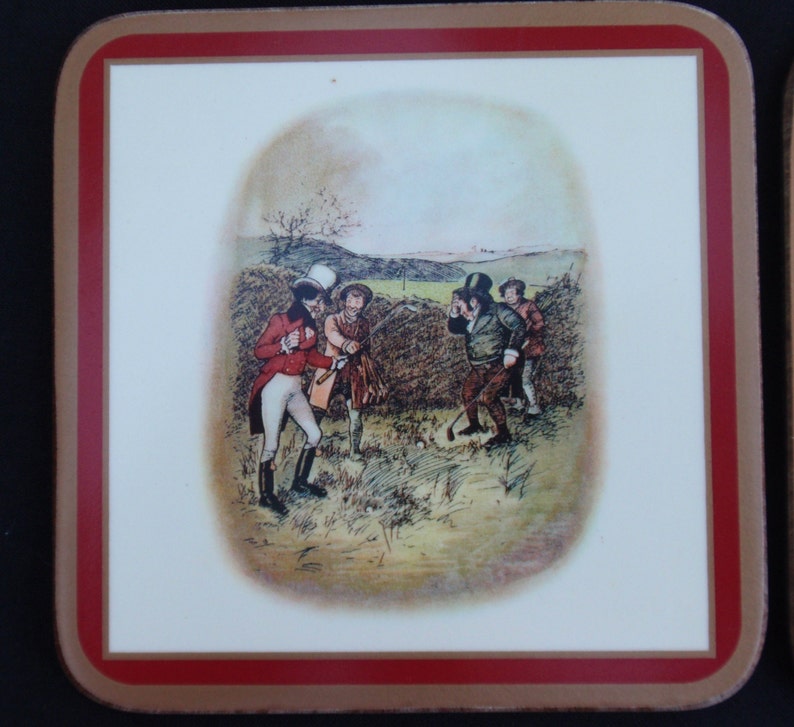 May include: A vintage-style coaster featuring a colorful illustration of four men playing golf in a field. The men are dressed in traditional clothing, and the scene is set against a backdrop of rolling hills.