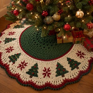 May include: A round, crocheted Christmas tree skirt featuring a dark green center and a wide, cream-colored border. The border is decorated with repeating patterns of dark green pine trees and deep red snowflakes, finished with a scalloped edge.