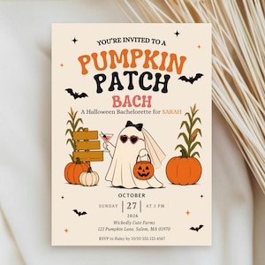 May include: A cream-colored invitation card featuring the text YOU'RE INVITED TO A PUMPKIN PATCH BACH A Halloween Bachelorette for SARAH. It displays a ghost wearing a veil and heart sunglasses, holding a martini and a jack-o'-lantern bucket.