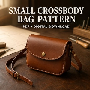 May include: A brown leather crossbody bag with a flap closure, a single brass-colored snap button, and an adjustable strap. The text SMALL CROSSBODY BAG PATTERN PDF • DIGITAL DOWNLOAD is displayed above the bag on a dark background.