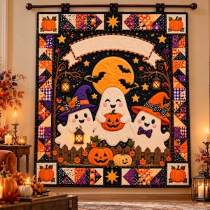 May include: A rectangular wall quilt featuring three white ghosts, one wearing a purple hat and one wearing an orange hat, standing behind a wooden fence with pumpkins. The background includes a large yellow moon, bats, and stars, framed by a colourful patchwork border.